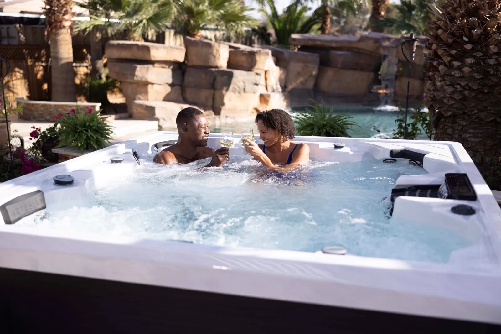Artesian spa glowing on a patio on a crisp autumn evening