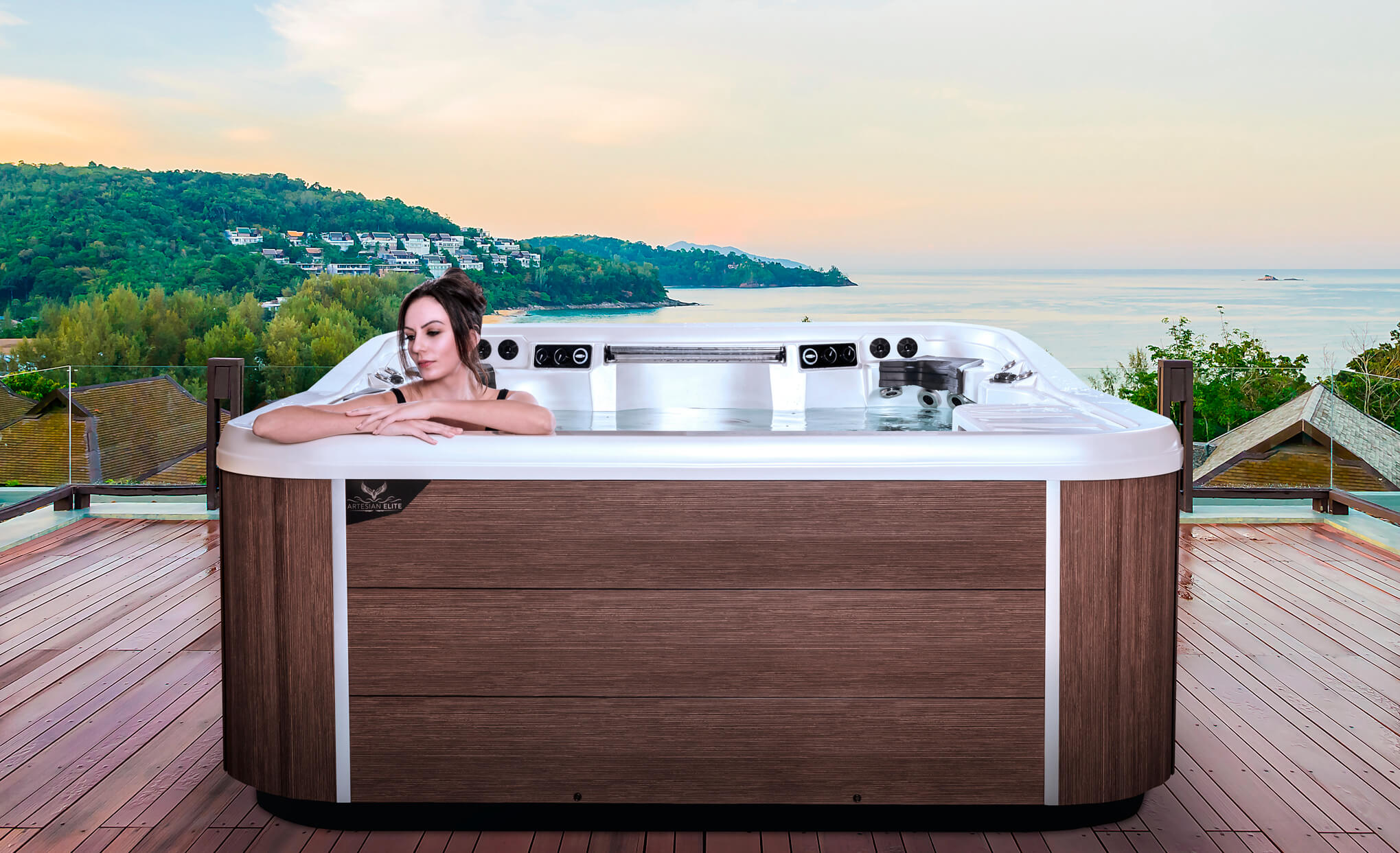 Artesian spa steaming on a landscaped patio on a cool autumn evening